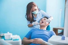 ขูดหินปูนพร้อมเคลือบฟลูออไรด์ ใช้สิทธิประกันสังคม