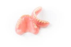 ทำฟันปลอมโครงพลาสติกทั้งปาก